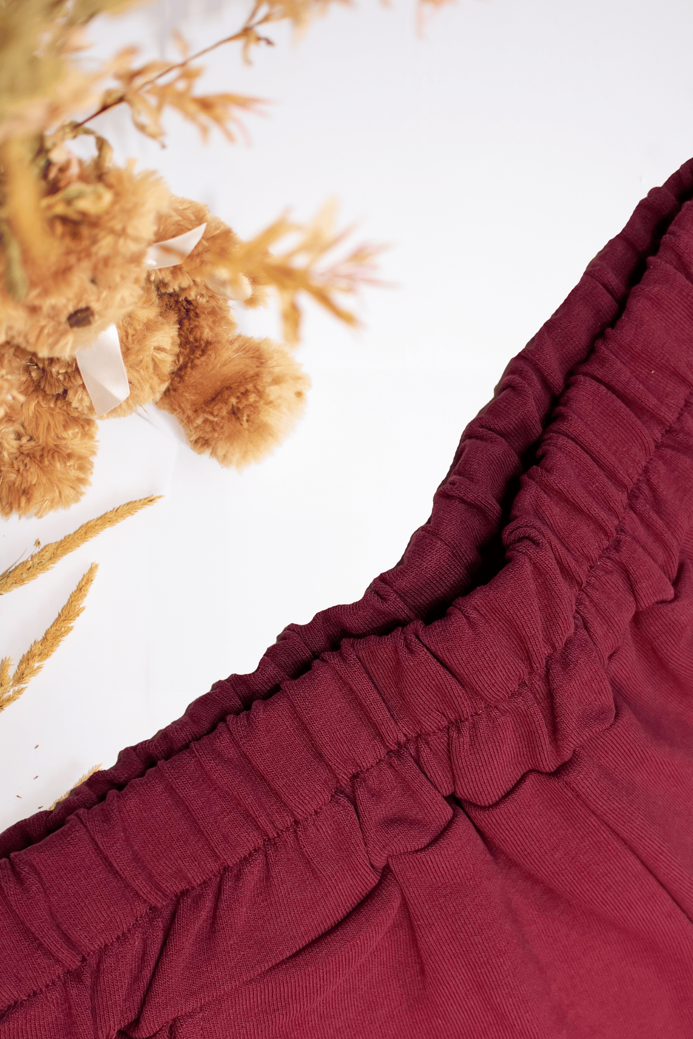 Bordo spalvos kelnės vaikams | Be pūkelio - Stiliaus detalė