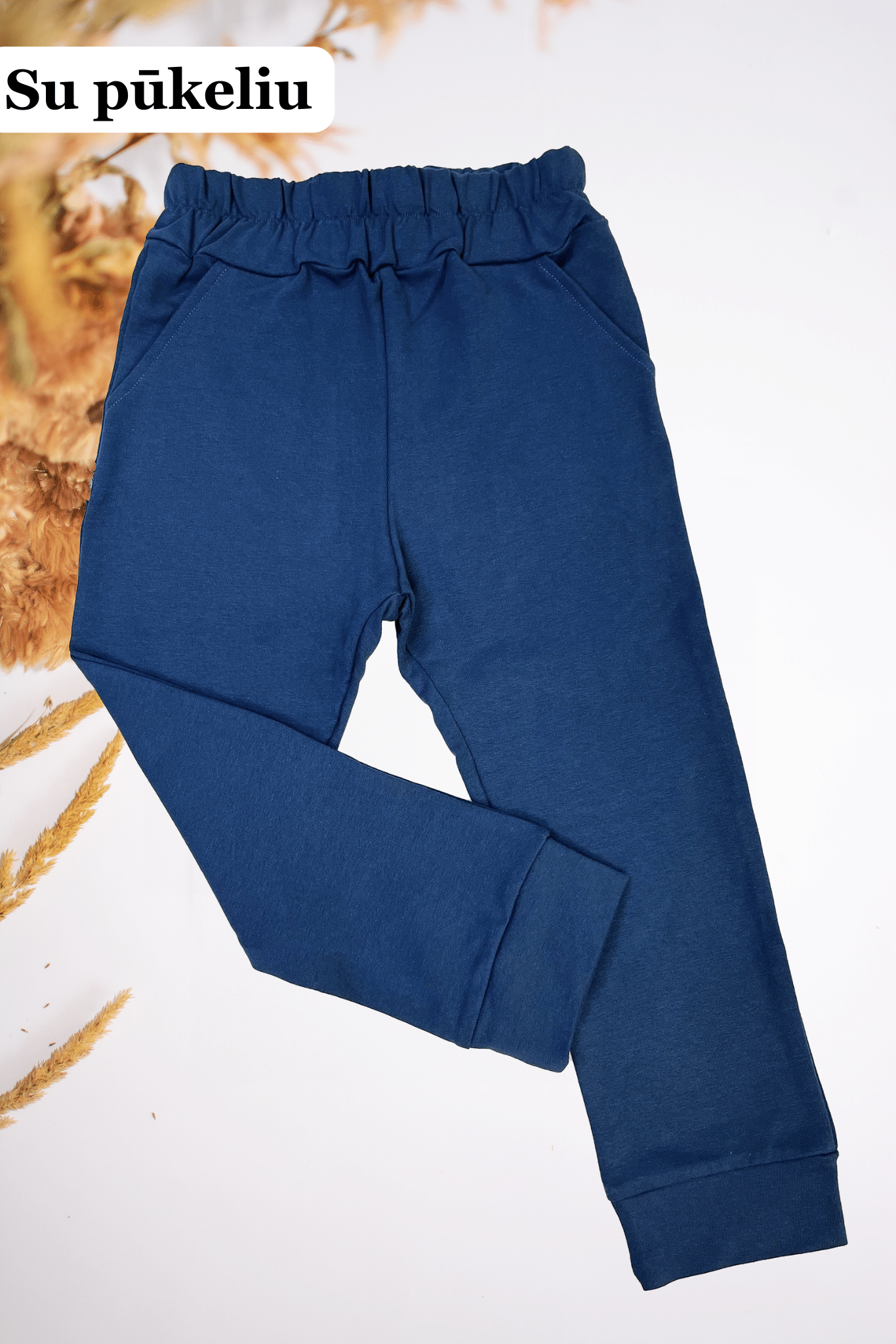 Indigo spalvos kelnės vaikams | Su pūkeliu - Stiliaus detalė