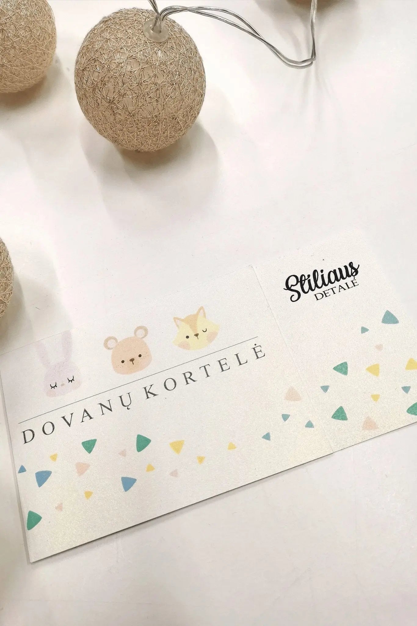 Fizinis dovanų kuponasStiliaus detalė